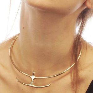 Silver tone designer choker and cuff bracelet.